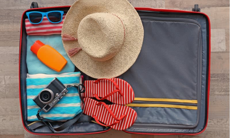 Susun Barang dalam Koper dengan Baik